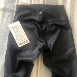 New with tags Lululemon wunder under high rise 28 inch length SHINE